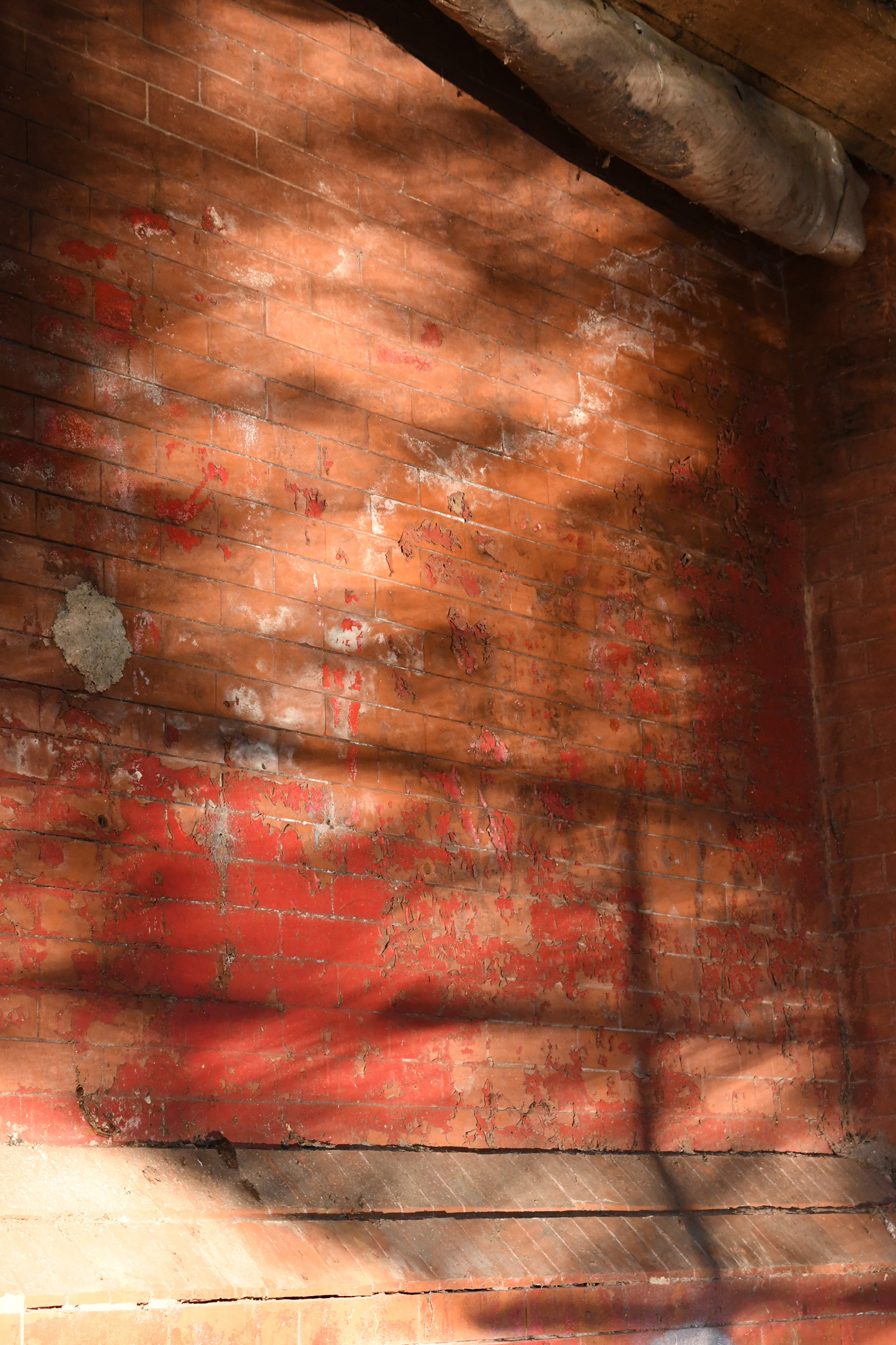 Light reflected off of water onto brick, Prospect Park